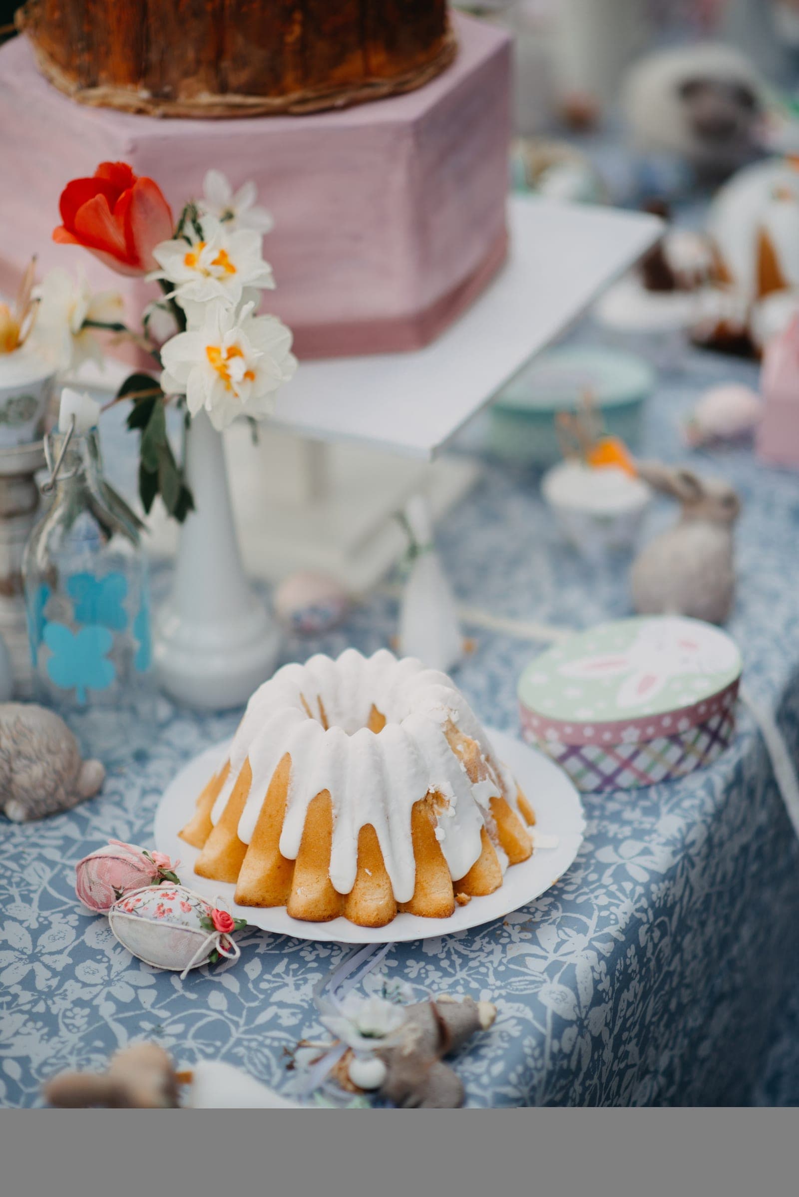 Dessert table with bundt cake and treats