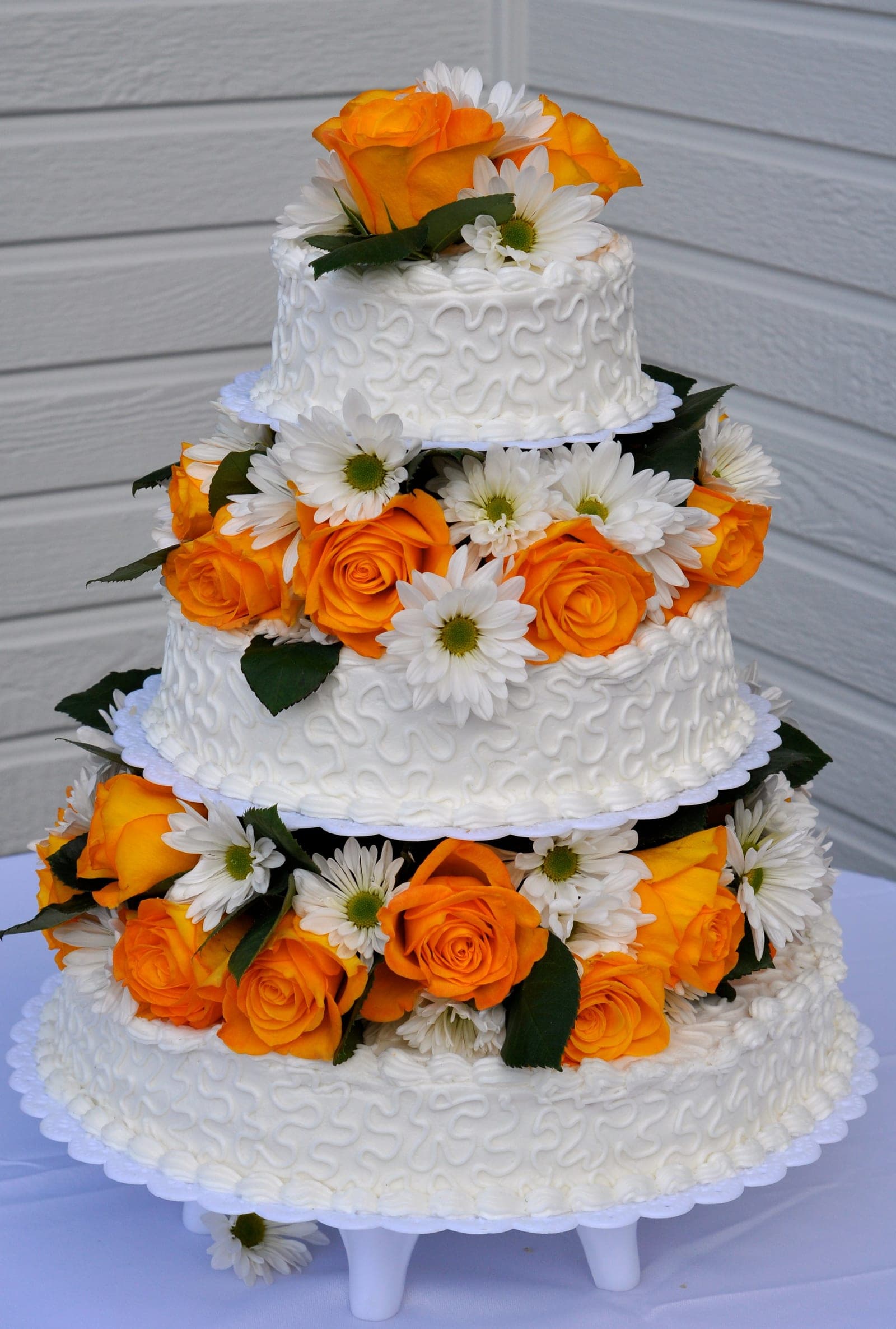 Celebration cake with fresh roses