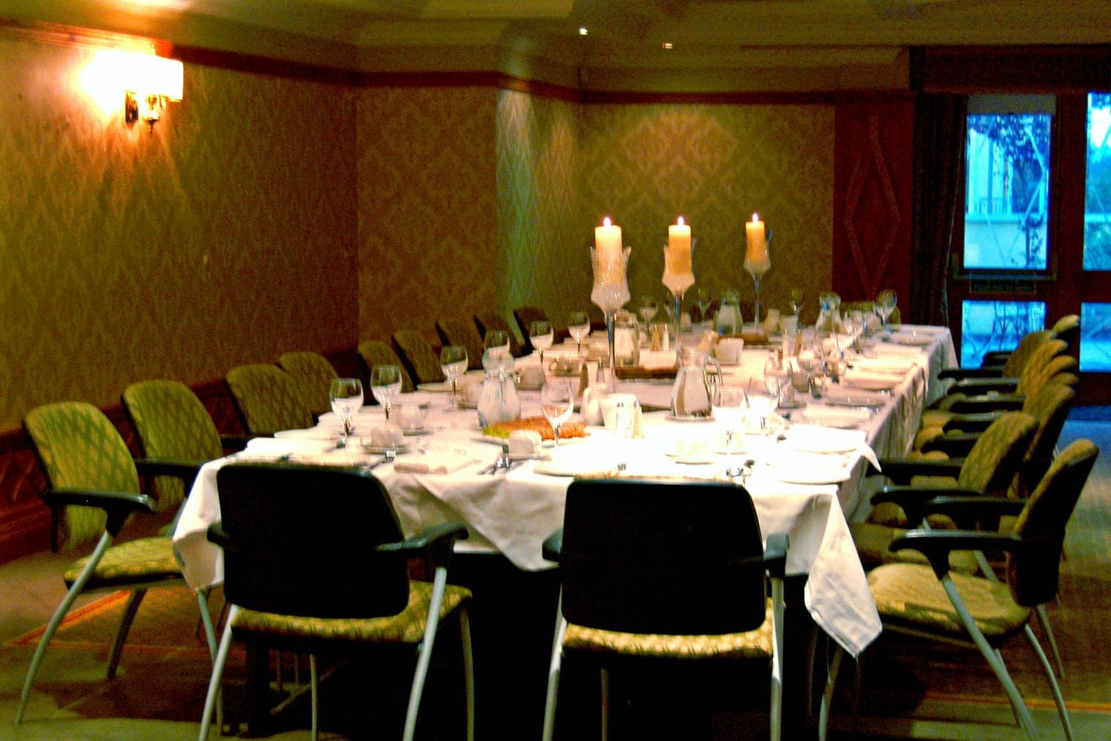 Candlelit dinner table setting